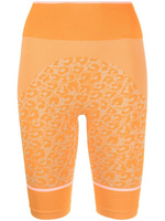 Adidas by Stella McCartney облегающие шорты с леопардовым принтом, оранжевый
